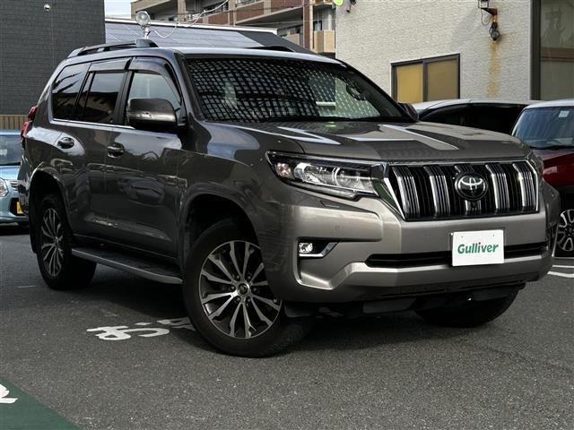 ランドクルーザープラド(トヨタ) ＴＺ−Ｇ　ワンオーナー・純正ナビ・ＡＭ／ＦＭ・ＵＳＢ・ミラーキャスト・Ｂｌｕｅｔｏｏｔｈ・クルーズコントロール・レーンキープ・パドルシフト・ハンズフリー・オートライト・オートマチックハイビーム・電動格納ミラー 中古車画像