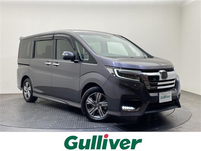 ステップワゴンスパーダ(ホンダ) ｅ：ＨＥＶスパーダ　Ｇ・ＥＸ　ホンダセンシング　純正１１．６インチフリップダウンモニター／純正１０インチナビ／フルセグＴＶ／ＥＴＣ２．０／ドライブレコーダー／ハーフレザーシート／シートヒーター／両側電動スライドドア／わくわくゲート／ＬＥＤ／禁煙車 中古車画像