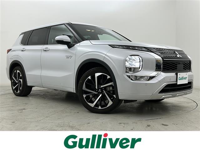 アウトランダーＰＨＥＶ(三菱) Ｐ　禁煙車／ＢＯＳＥ／全周囲カメラ／マイパイロット／ＢＳＭ／ＲＣＴＡ／純正ナビ／フルセグ／レザーシート／シートヒーター／電動リアゲート／ＬＥＤヘッドライト／ＥＴＣ２．０／パドルシフト／ステアヒーター 中古車画像