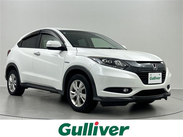 ヴェゼル(ホンダ) ハイブリッドＸ　禁煙車　４ＷＤ　シートヒーター　パドルシフト　純正ナビ　バックカメラ　アルミ付きサマータイヤ積込　クルーズコントロール　純正ＬＥＤライト　電動パーキングブレーキ　ステアリングリモコン　フォグライト 中古車画像