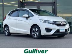 フィットハイブリッド Lパッケージ 純正ナビ バックカメラ ETC 衝突軽減ブレーキ 横滑り防止 クルーズコントロール ハーフレザーシート LEDヘッドライト オートライト コンフォートビューパッケージ あんしんパッケージ スマートキー 中古車画像