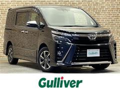 ヴォクシー ZS 煌III 4WD 社外9インチナビ トヨタセーフティセンス 衝突軽減ブレーキ クルーズコントロール レーンキープアシスト 両側パワースライドドア 社外フリップダウンモニター ハーフレザーシート ドラレコ 中古車画像