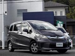 フリード G プレミアムエディション 純正7インチナビ/フルセグTV/Bluetooth/CD/DVD/バックカメラ/両側パワースライドドア/クルーズコントロール/ビルトインETC/オートライト 中古車画像