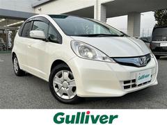 フィットハイブリッド スマートセレクション 社外ナビ(ワンセグ/FM/AM//Bluetooth)スマートキー クルーズコントロール ETC USB 純正フロアマット ステアリングリモコン オートライト ドアバイザー 中古車画像