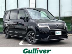 ステップワゴン e:HEVスパーダ 登録済み未使用車/純正ナビ/バックモニター/フリップダウンモニター/ハーフレザーシート/シートヒーター/レーダークルーズコントロール/パドルシフト/レーンキープアシスト/両側パワースライドドア ESC 中古車画像