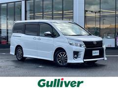 ヴォクシー ZS 煌 社外ナビ DVD Bluetooth フルセグTV 社外フリップダウンモニター 社外前後ドラレコ型デジタルインナーミラー 両側パワースライドドア バックカメラ 純正フロアマット ETC 中古車画像