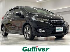 フィットハイブリッド Fコンフォートエディション 純正7インチナビ オートライト ETC 純正マット レーンキープアシスト BIuetooth フルセグ バックモニター 衝突軽減システム クルーズコントロール フォグ LEDヘッドライト 中古車画像