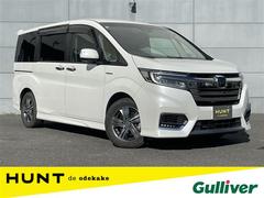 ステップワゴンスパーダ スパーダハイブリッド G・EX ホンダセンシング 純正フリップダウンモニター 純正10インチナビ バックカメラ ETC ステアリングスイッチ 電動パーキングブレーキ 両側パワースライドドア LEDヘッドライト オートライト フォグ スマートキー 中古車画像