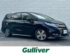 オデッセイハイブリッド ハイブリッドアブソルート・EXホンダセンシング 11.6インチ純正ナビ 全方位カメラ ブラインドスポットモニター フリップダウンモニター ホンダセンシング レーダークルーズコントロール 両側パワースライドドア ETC LED シートヒーター 鍵2本 中古車画像