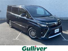 ヴォクシー ハイブリッドZS 純正ナビ フルセグTV Bluetooth接続 DVD再生 クルコン 両側パワスラ トヨタセーフティーセンス プリクラッシュセーフティ プッシュスタート スマートキー スペアキー 前席シートヒーター 中古車画像