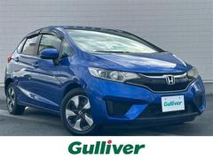 フィットハイブリッド Fパッケージ 社外ナビ/バックカメラ/LEDヘッドライト/オートライト/ステスイ/電格ウインカーミラー/ETC/純正フロアマット/純正ホイールカバー/ドアバイザー/前後ドラレコ/プッシュスタート/スマートキー 中古車画像