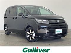 フリード e:HEVエアー EX ・登録済未使用車・衝突軽減ブレーキ・誤発進抑制機能・後方誤発進抑制機能・追従式クルーズコントロール・コーナーセンサー・純正9型ナビ・バックカメラ・リアクーラー・前席シートヒーター・BSM・LEDライト 中古車画像