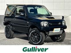 ジムニー クロスアドベンチャーXC 社外ディスプレイオーディオ Bluetooth/AM・FM/AppleCarPlay/AndroidAuto 社外マフラー 社外リアスポイラー 純正ハーフレザーシート 純正フロアマット シートヒーター 中古車画像