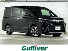 ヴォクシー ZS 煌II 禁煙 純正10型ナビ 12型フリップダウンモニター セーフティセンス オートマチックハイビーム 前後ドライブレコーダー ETC クリアランスソナー クルーズコントロール フロアマット ドアバイザー 中古車画像