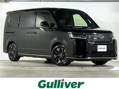 ステップワゴン e:HEVスパーダ 禁煙 純正9型ナビ バックカメラ BSi 両パワースライドドア パワーバックドア シートヒーター コンビシート ETC2.0 LEDアクティブコーナリングライト 電動パーキング オートブレーキホールド 中古車画像