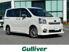 ヴォクシー ZS 煌Z 純正ナビ(フルセグ/BT/CD/DVD)/3列シート/バックカメラ/純正LEDヘッドライト/オートライト/両側パワスラ/ETC/純正16インチAW/スマートキー/盗難防止装置/純正フロアマット 中古車画像