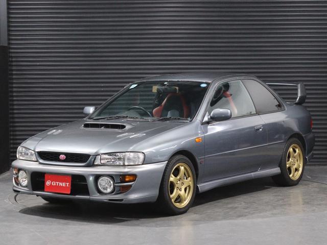 インプレッサ ＷＲＸタイプＲ　ＳＴｉバージョンＶ　ワンオーナー　保証書　取扱説明書　修復歴無　キーレス　フロントフォグランプ　大型リアウイング　ＳＴＩマフラー／タワーバー　純正１６インチＡＷ　専用キャリパー　専用セミバケットシート（1枚目）