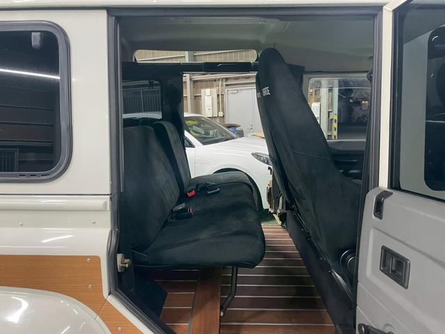ディフェンダー 110SW 右H 正規ディーラー車 EXウッドデカール BRIDEセミバケットシート Sヒーター AC 社外ディスプレイオーディオ Pioneerスピーカー バックカメラ Pウィンドウ ウッド調フロア 乗降ステップ 社外サス 16インチW NOX/PM適合(20枚目)