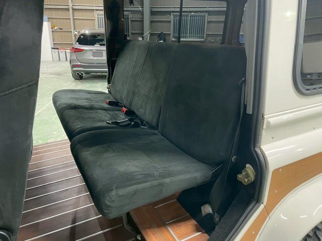 ディフェンダー 110SW 右H 正規ディーラー車 EXウッドデカール BRIDEセミバケットシート Sヒーター AC 社外ディスプレイオーディオ Pioneerスピーカー バックカメラ Pウィンドウ ウッド調フロア 乗降ステップ 社外サス 16インチW NOX/PM適合(25枚目)