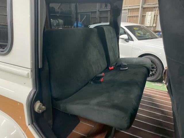 ディフェンダー 110SW 右H 正規ディーラー車 EXウッドデカール BRIDEセミバケットシート Sヒーター AC 社外ディスプレイオーディオ Pioneerスピーカー バックカメラ Pウィンドウ ウッド調フロア 乗降ステップ 社外サス 16インチW NOX/PM適合(26枚目)