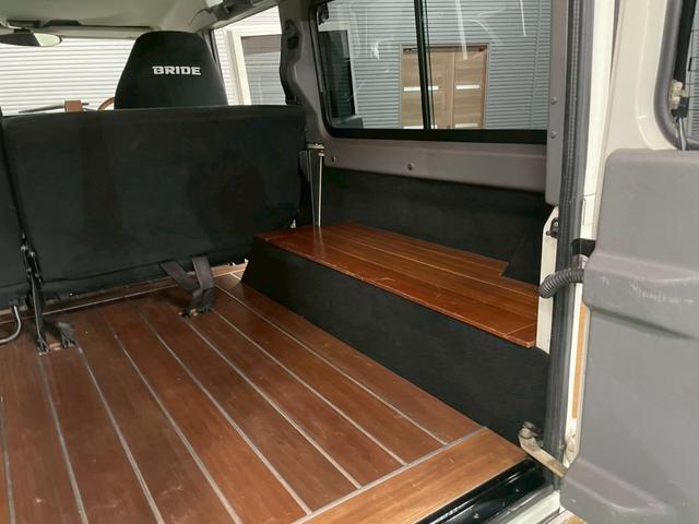 ディフェンダー 110SW 右H 正規ディーラー車 EXウッドデカール BRIDEセミバケットシート Sヒーター AC 社外ディスプレイオーディオ Pioneerスピーカー バックカメラ Pウィンドウ ウッド調フロア 乗降ステップ 社外サス 16インチW NOX/PM適合(27枚目)