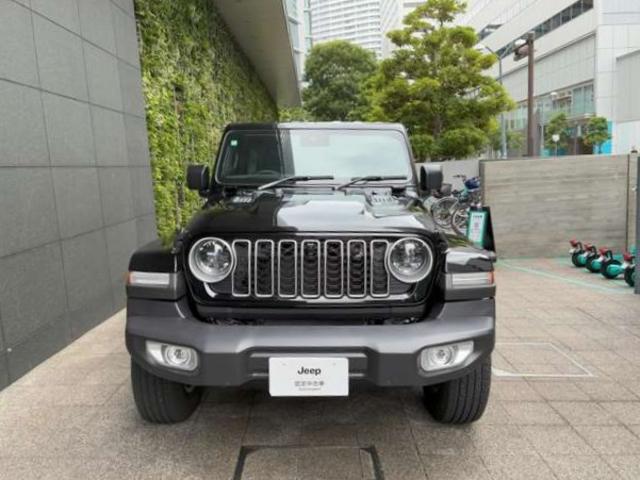 ジープ・ラングラーアンリミテッド サハラ 認定中古車 4WD ACC フリップトップサンライダー付き車両 ETC2.0 サイドステップ オールテレインタイヤ 純正ホイール 18インチ ナビ12.3インチ パワーシート(2枚目)