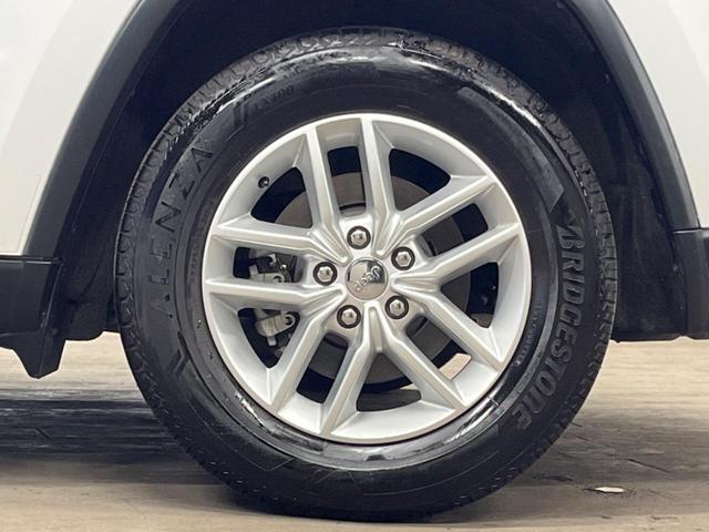 ジープ・グランドチェロキー リミテッド　純正ナビ　地デジ　リアビューカメラ　アダプティブクルーズコントロール　ブラインドスポットモニター　ベンチレーション　純正１８インチアルミ　パワーバックドア　ＨＩＤヘッドランプ　ＡＬＰＩＮＥ製サウンド（36枚目）