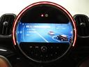 クーパーＤクロスオーバープレミアム＋Ｐクラシクトリム　認定中古車輌　禁煙使用定期点検整備記録簿　ＡＣＣ搭載　ヒーター付モルトブラウンレザーシート　パワーテールゲート　アップルカープレイ対応タッチＨＤＤナビ　パークセンサー付バックカメラ　ピクニックベンチ（9枚目）