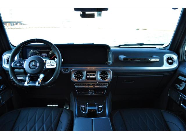 Gクラス G63 AMG世田谷特別オーダーモデル法人禁煙屋根保管左H特注オーダーカラーデザートサンドカーボンインテリア&ステアリングナイトパッケージエクスクルーシブPKG黒本革ベンチレーター22インチアルミディーラー(6枚目)