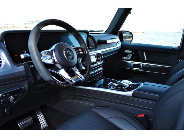 Gクラス G63 AMG世田谷特別オーダーモデル法人禁煙屋根保管左H特注オーダーカラーデザートサンドカーボンインテリア&ステアリングナイトパッケージエクスクルーシブPKG黒本革ベンチレーター22インチアルミディーラー(7枚目)
