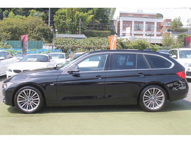 ３シリーズ ３２０ｉツーリング　ラグジュアリー　走行４．１万キロ　２Ｌターボエンジン　黒本革シート　衝突軽減ブレーキ　純正ＨＤＤナビ　バックカメラ　パークセンサー　シートヒーター　純正１８インチＡＷ　電動リアゲート　前後純正ドラレコ　禁煙車（7枚目）