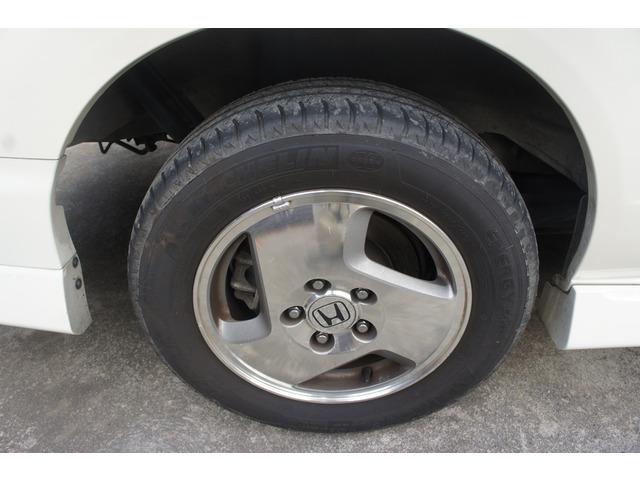 ステップワゴン Ｄ　４ＷＤ　片側電動スライドドア　エアロ　３列シート　キーレス　記録簿　純正アルミ（35枚目）