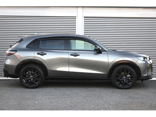 ZR-V e:HEV Z特別仕様車ブラックスタイル 1オーナー/新車PKG/全方位カメラ/黒革シート/前後シート・ステアリングヒーター/9インチナビ・TV/ワイヤレス充電/ブラインドスポットモニター/パワーバックドア/ホンダセンシング(7枚目)