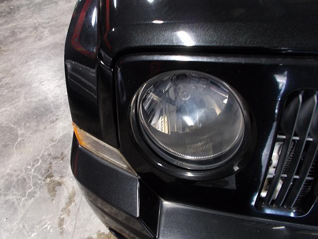 ジープ・パトリオット リミテッド ディーラー整備車両 整備記録簿 フルタイム4WD 黒革シート クルーズコントロール HDDナビ 地デジフルセグテレビ CD録音 DVD再生 USB スペアキー ETC 社外16インチアルミ(10枚目)