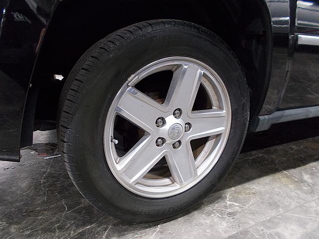 ジープ・パトリオット リミテッド ディーラー整備車両 整備記録簿 フルタイム4WD 黒革シート クルーズコントロール HDDナビ 地デジフルセグテレビ CD録音 DVD再生 USB スペアキー ETC 社外16インチアルミ(20枚目)