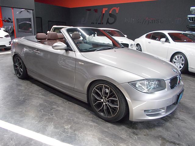 1シリーズ 120i カブリオレ ディーラー整備車両 整備記録簿 電動オープン スーパースプリントマフラー ダウンサス MOMO17インチアルミ 茶革シート HDDナビ 地デジフルセグテレビ CD録音 DVD再生 スペアキー ETC(5枚目)