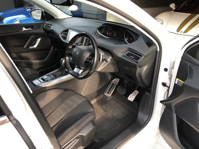 308 SW アリュール ブルーHDi 走行8.1万キロ・禁煙・取説・記録簿・純正ナビ・地デジTV・バックカメラ・ETC2.0・取説・記録簿・クリアランスソナー・プライバシーガラスリア3面・ルーフレール・キセノン・ヘッドライトウォッシャー(14枚目)