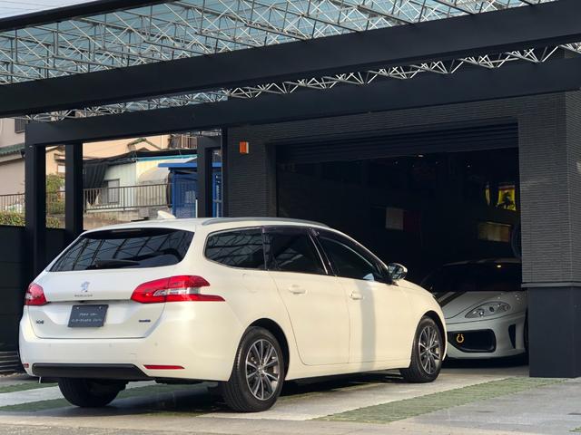 308 SW アリュール ブルーHDi 走行8.1万キロ・禁煙・取説・記録簿・純正ナビ・地デジTV・バックカメラ・ETC2.0・取説・記録簿・クリアランスソナー・プライバシーガラスリア3面・ルーフレール・キセノン・ヘッドライトウォッシャー(68枚目)