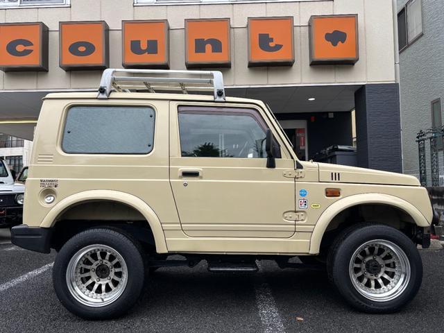 ジムニー ワイルドウインド　リフトアップ　社外オーバーフェンダー　社外フロントバンパー　社外アルミホイール　社外サイドステップ　社外フロントグリル　社外ステアリング　ステアリングダンパー（8枚目）