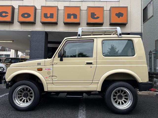 ジムニー ワイルドウインド　リフトアップ　社外オーバーフェンダー　社外フロントバンパー　社外アルミホイール　社外サイドステップ　社外フロントグリル　社外ステアリング　ステアリングダンパー（9枚目）