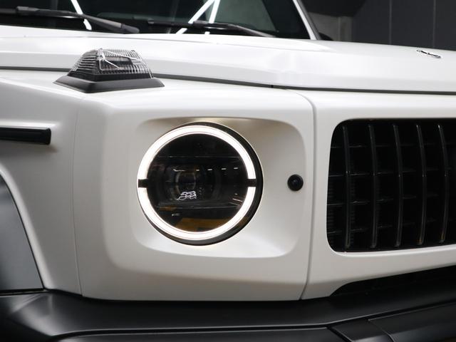 Gクラス G63 マグノヒーローエディション 4WD 禁煙車 限定75台 マグノオパリスホワイト カーボンファイバーインパネ カーボンパフォーマンスステアリング 純正AMG22インチ鍛造ホイール 社外電動サイドステップ(24枚目)