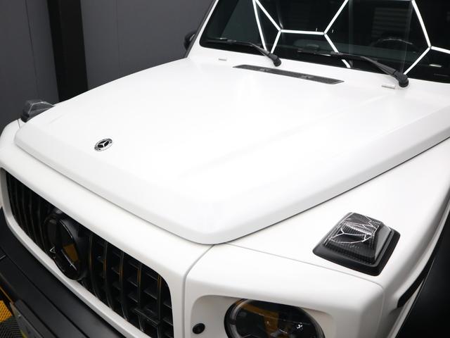 Gクラス G63 マグノヒーローエディション 4WD 禁煙車 限定75台 マグノオパリスホワイト カーボンファイバーインパネ カーボンパフォーマンスステアリング 純正AMG22インチ鍛造ホイール 社外電動サイドステップ(28枚目)