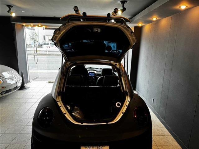 ニュービートル LZ リフトアップ カスタム キャンピング 左ハンドル フロア6AT 障害物センサー 横滑り防止装置 ETC フルセグ 本革シート キーレス サンルーフ 車検整備付き(7枚目)