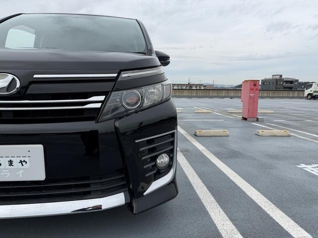 ヴォクシー ＺＳ　純正ナビゲーション　バックカメラ　純正フリップダウンモニター　７人乗り　両側パワースライドドア（12枚目）