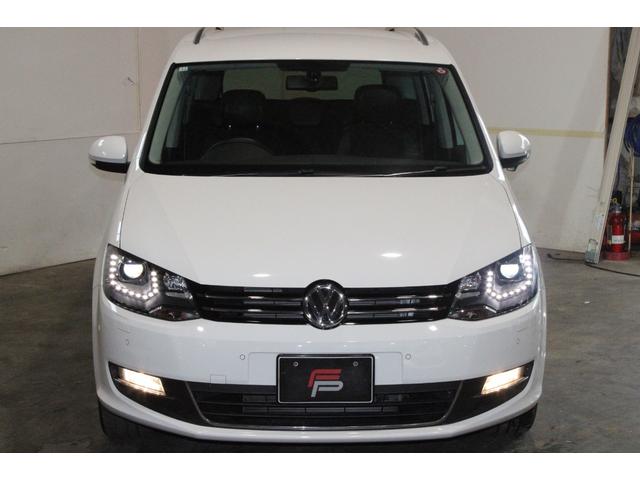 シャラン ＴＳＩ　ハイラインブルーモーションテクノロジー　禁煙　新品天張り張替済　キャンディホワイト　純正ナビ地デジＢカメラ　Ｂｌｕｅｔｏｏｔｈ　パドルシフト　クルコン　ハイライン専用インテリア　シートヒーター　電動バックドア　ディーラー整備記録簿８枚（7枚目）