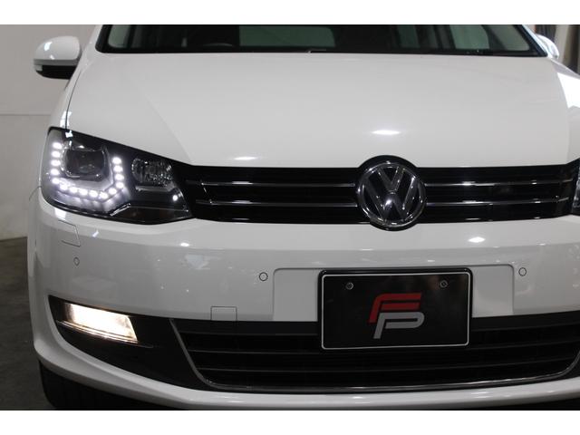 シャラン ＴＳＩ　ハイラインブルーモーションテクノロジー　禁煙　新品天張り張替済　キャンディホワイト　純正ナビ地デジＢカメラ　Ｂｌｕｅｔｏｏｔｈ　パドルシフト　クルコン　ハイライン専用インテリア　シートヒーター　電動バックドア　ディーラー整備記録簿８枚（58枚目）