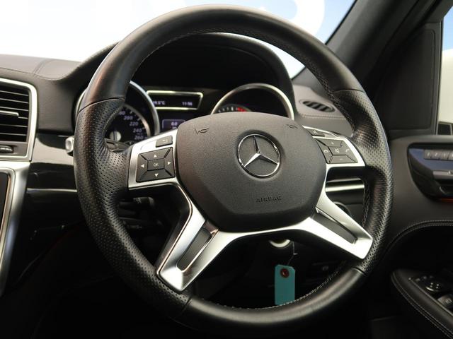 ML350ブルーテック4マチックAMGスポーツパック AMGエクスクルーシブPKG 黒革 全席シートヒーター レーダーセーフティ アルティコレザーダッシュボード 純正HDDナビ 全周囲カメラ 純正20インチAMGAW 電動リアゲート(9枚目)