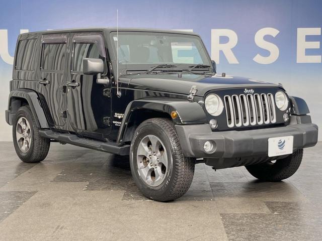 ジープ・ラングラーアンリミテッド サハラ　４ＷＤ　革シート／シートヒーター　ＡＬＰＩＮＥスピーカー　ナビ　クルーズコントロール　バック／サイドカメラ　フルセグＴＶ　Ｂｌｕｅｔｏｏｔｈ　ＣＤ／ＤＶＤ　純正１８インチＡＷ　オートライト　ＥＴＣ（45枚目）