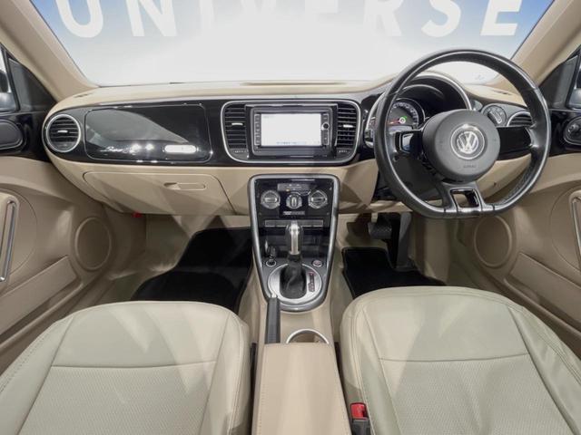 ザ・ビートル デザイン　バイキセノンヘッドライトＰＫＧ　７１６ＳＤＣＷナビＰＫＧ　フルセグＴＶ　クルーズコントロール　バックカメラ　カミングホーム／リビングホーム　純正１７インチＡＷ　ブラインドスポットモニター　オートライト（2枚目）