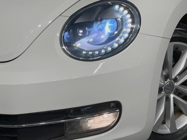 ザ・ビートル デザインレザーパッケージ クルーズコントロール パークディスタンスコントロール カミングホーム/リビングホーム ナビ フルセグTV 前席シートヒーター/ブラック革シート HIDヘッドライト 純正17インチAW パドルシフト(9枚目)
